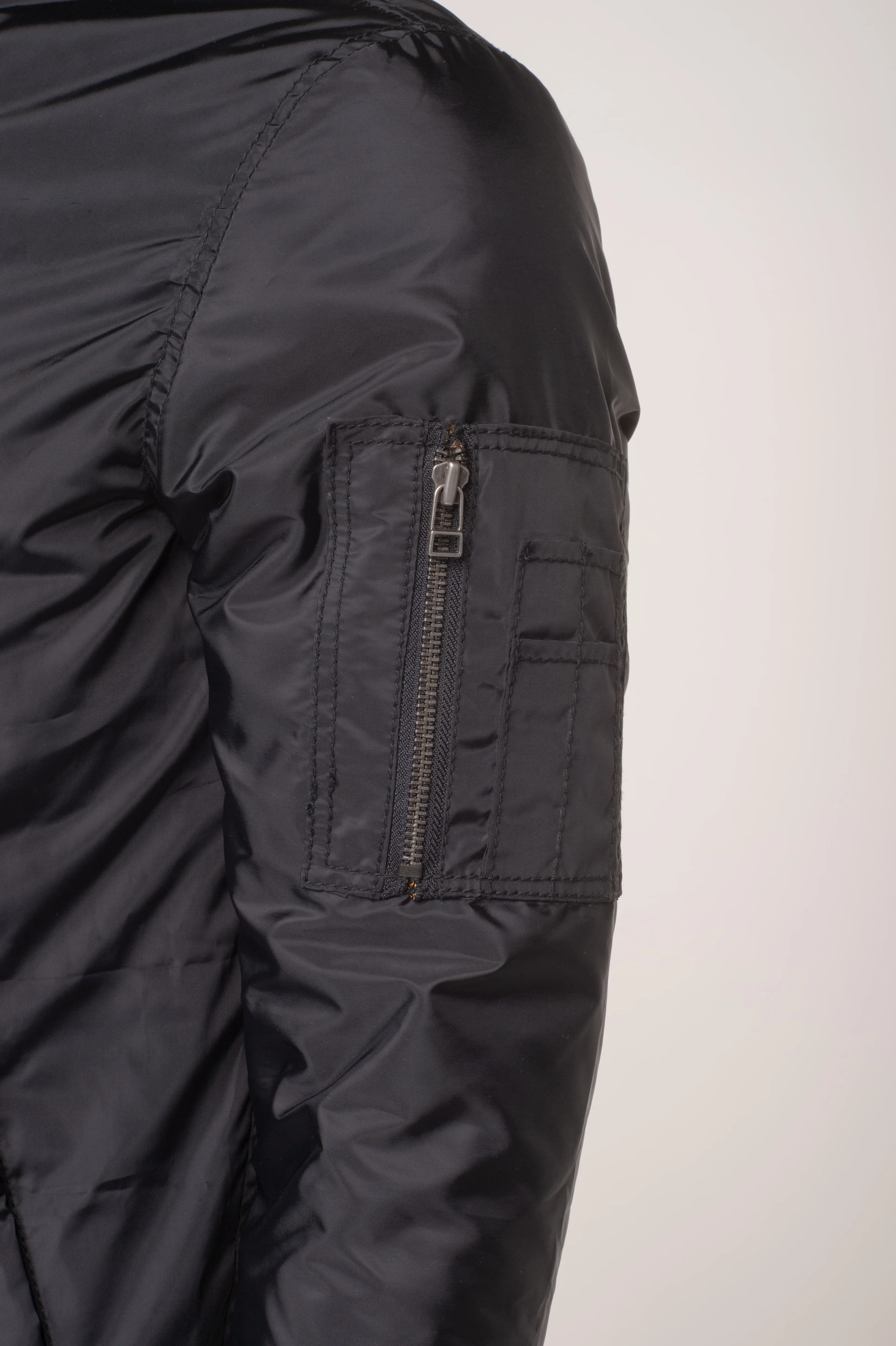 Allan's black Nylon flight jacket with ribbed waist